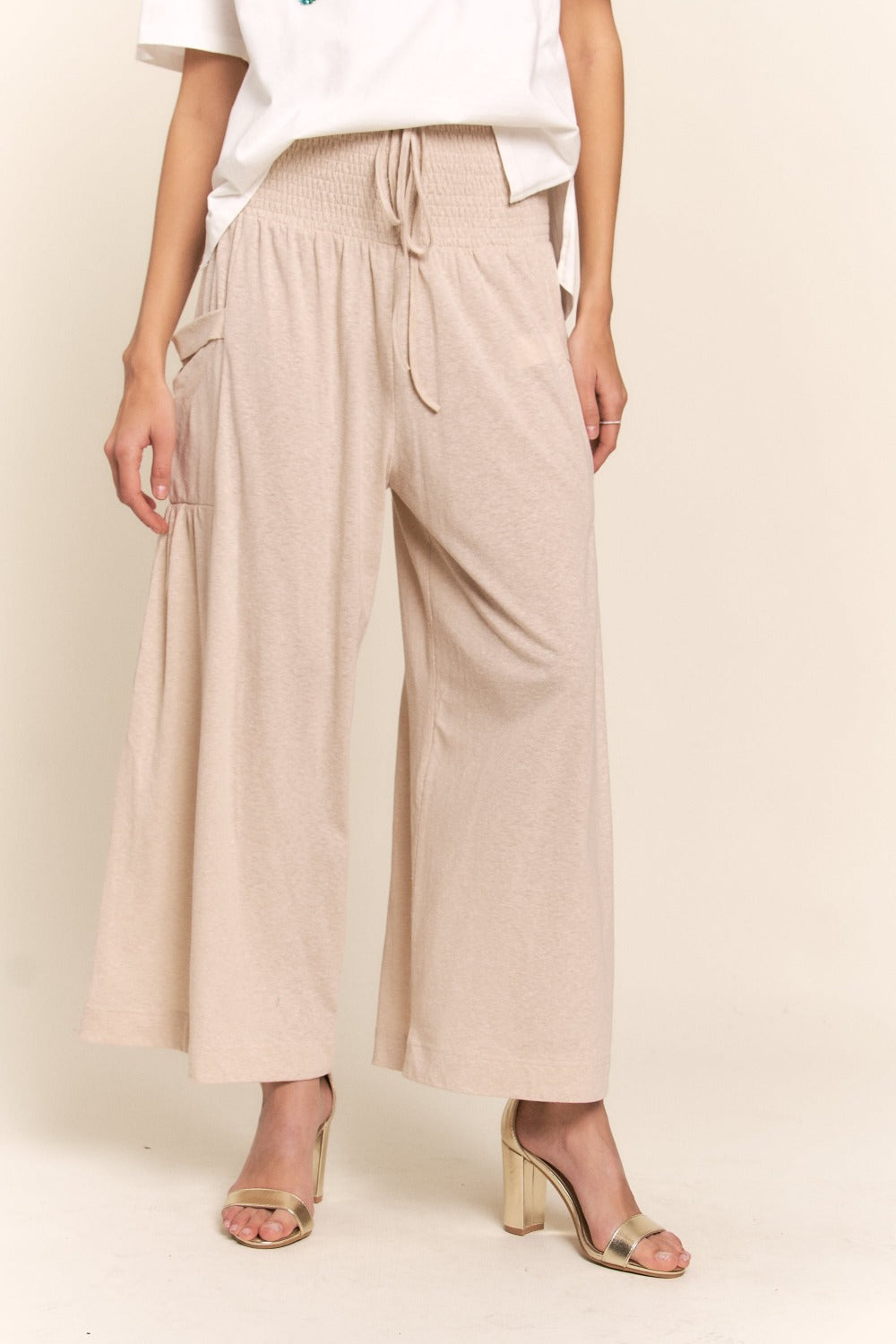 Bohemian Chic Wide Leg Pants with Smocked Waist and Pockets